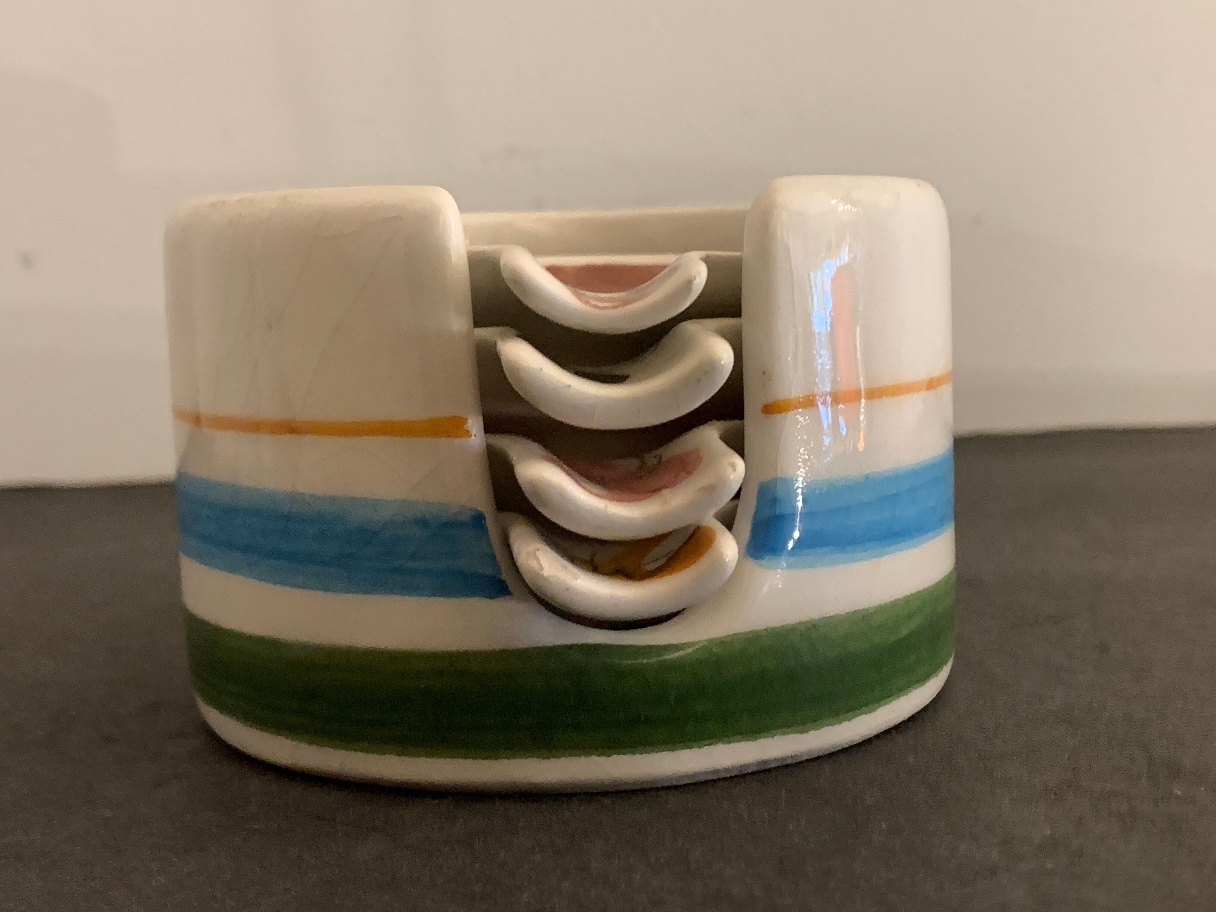 4 individual Italian ceramic stackable ashtrays with women's faces