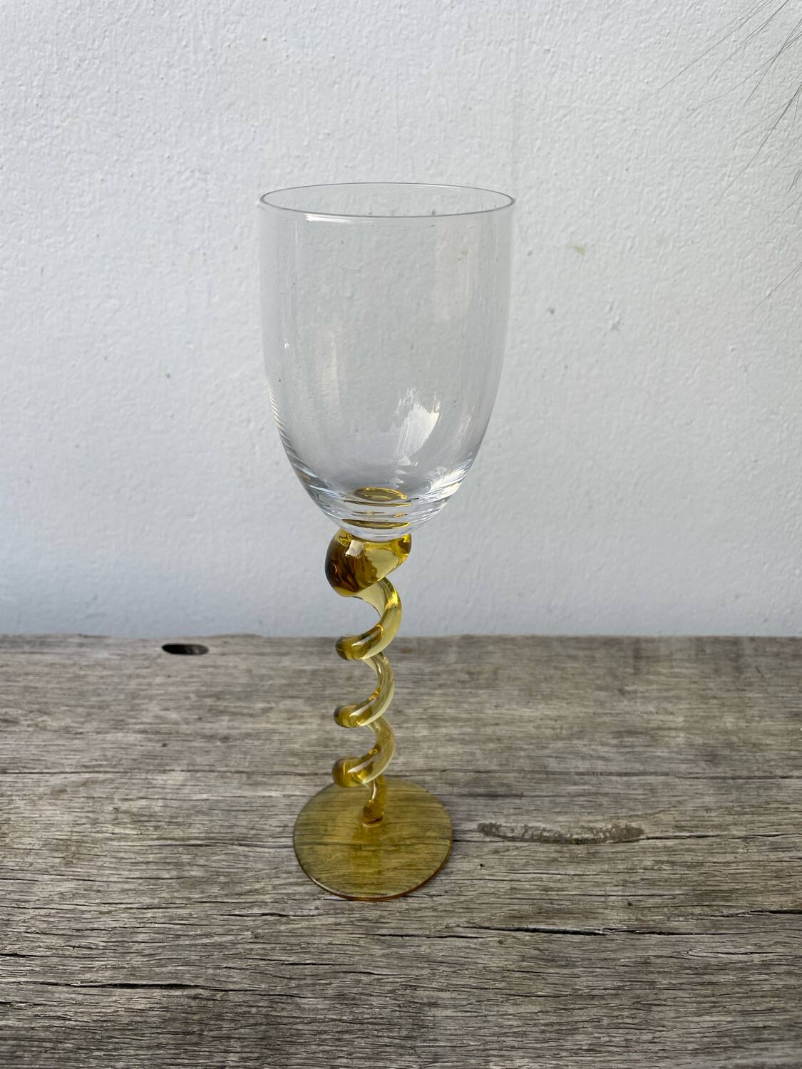 4 large, multicoloured, twisted champagne flutes