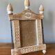 Beautiful Indian frame with wooden pediment carved in flat flowers and ceruse