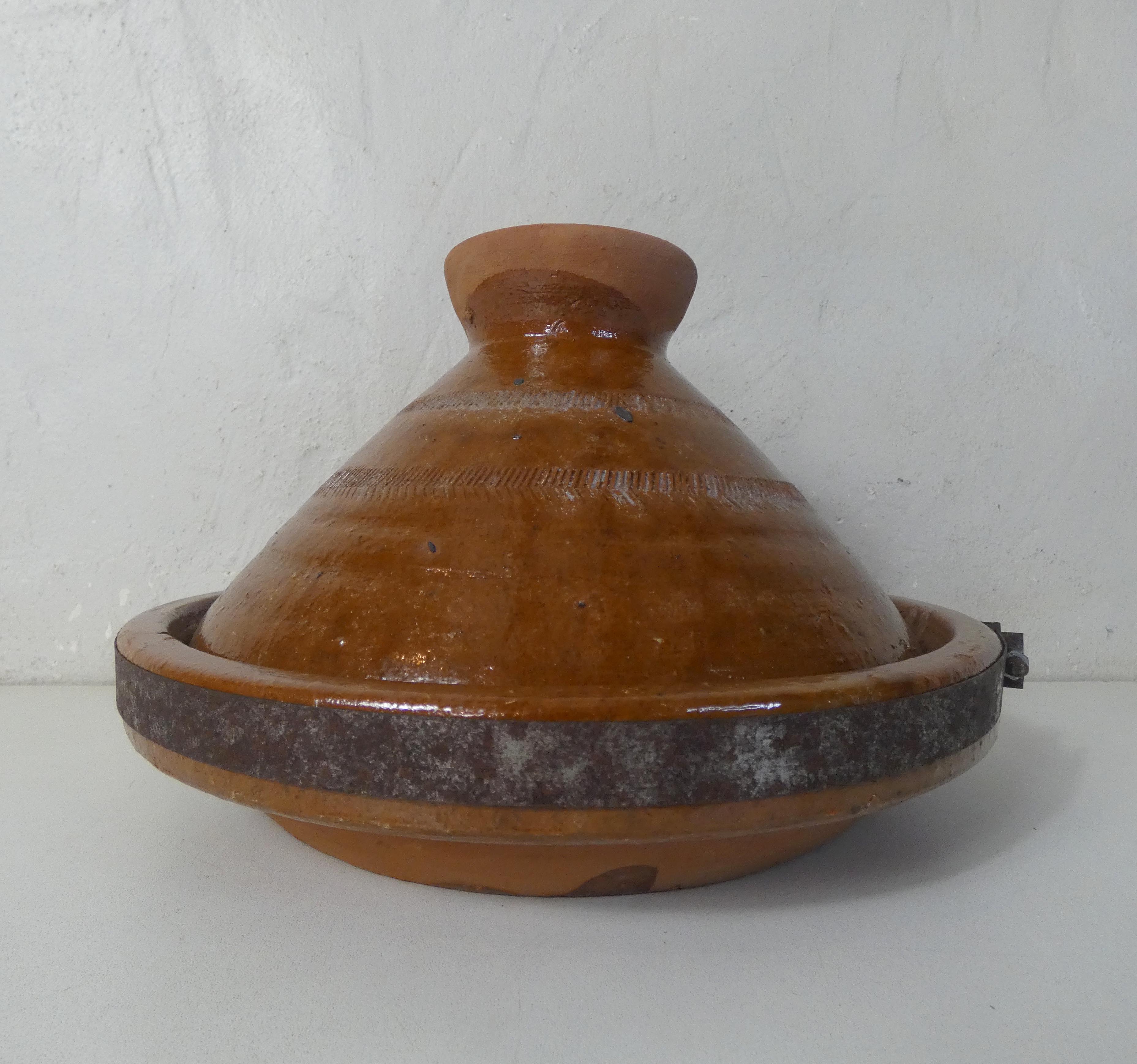 Old glazed terracotta tagine