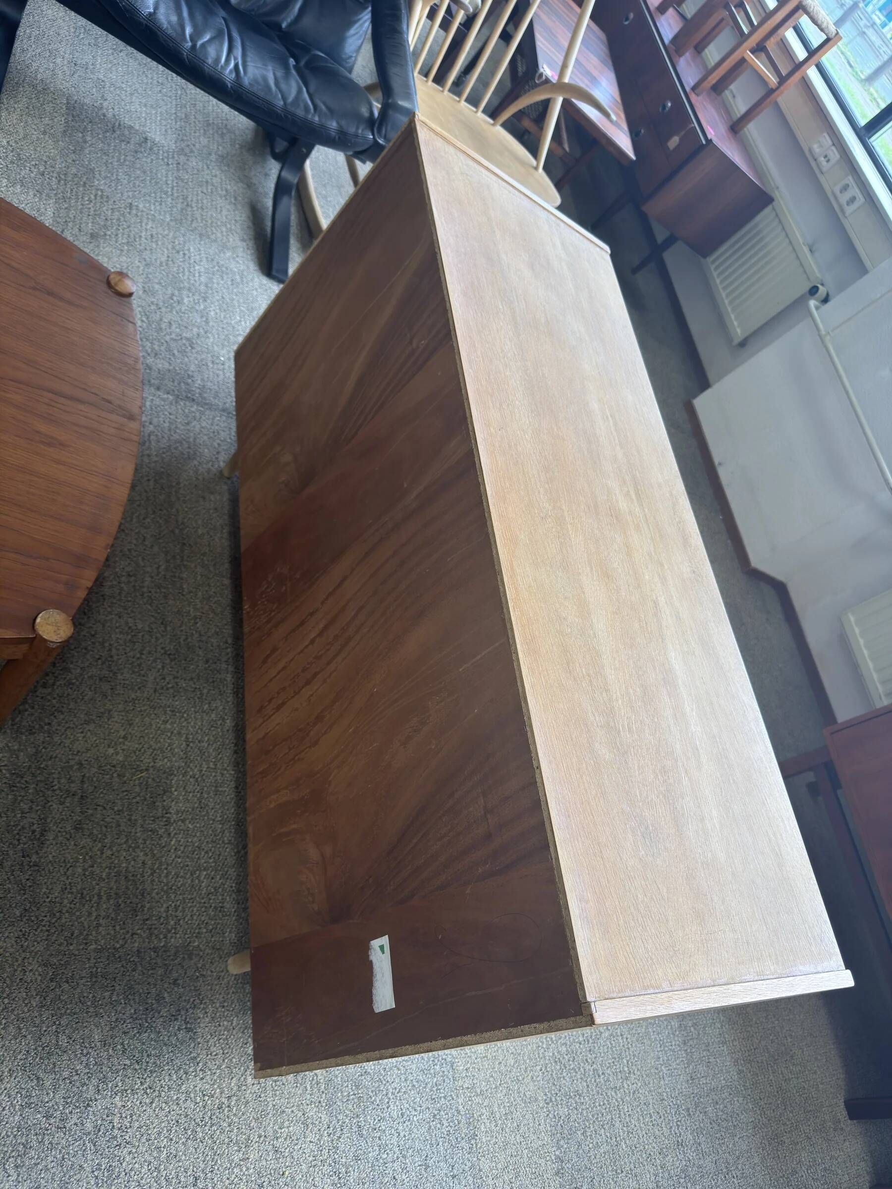 Danish buffet in light oak with sliding door and four drawers.