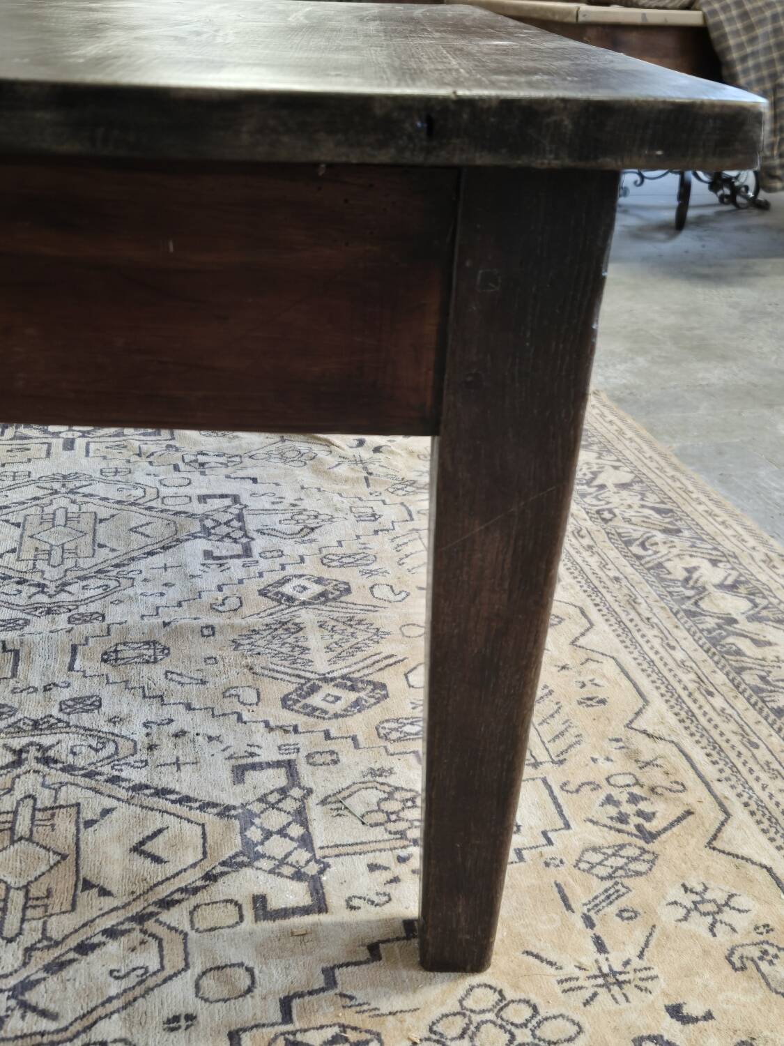 Rustic farmhouse coffee table from the 1900s with two drawers.
