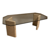 Dining table in travertine and smoked glass.