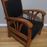 Colonial armchair in teak and black leather
