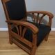 Fauteuil colonial en teck et cuir noir