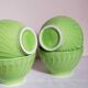 Four vintage spring green earthenware bowls