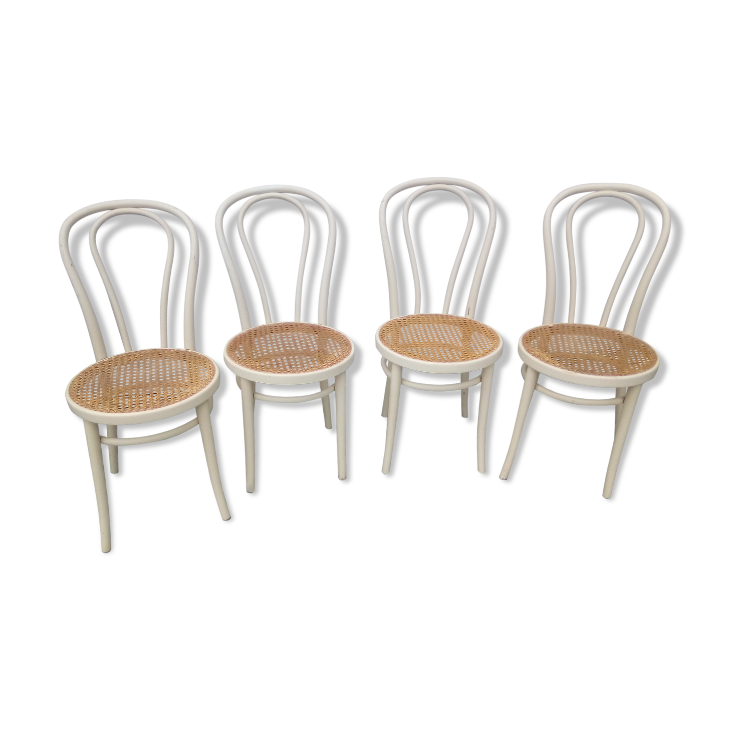 Lot of 4 bistro chairs in caned wood