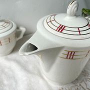 Vintage tea set in white porcelain with stripes, Moulin des Loups orcerame model "Richelieu"