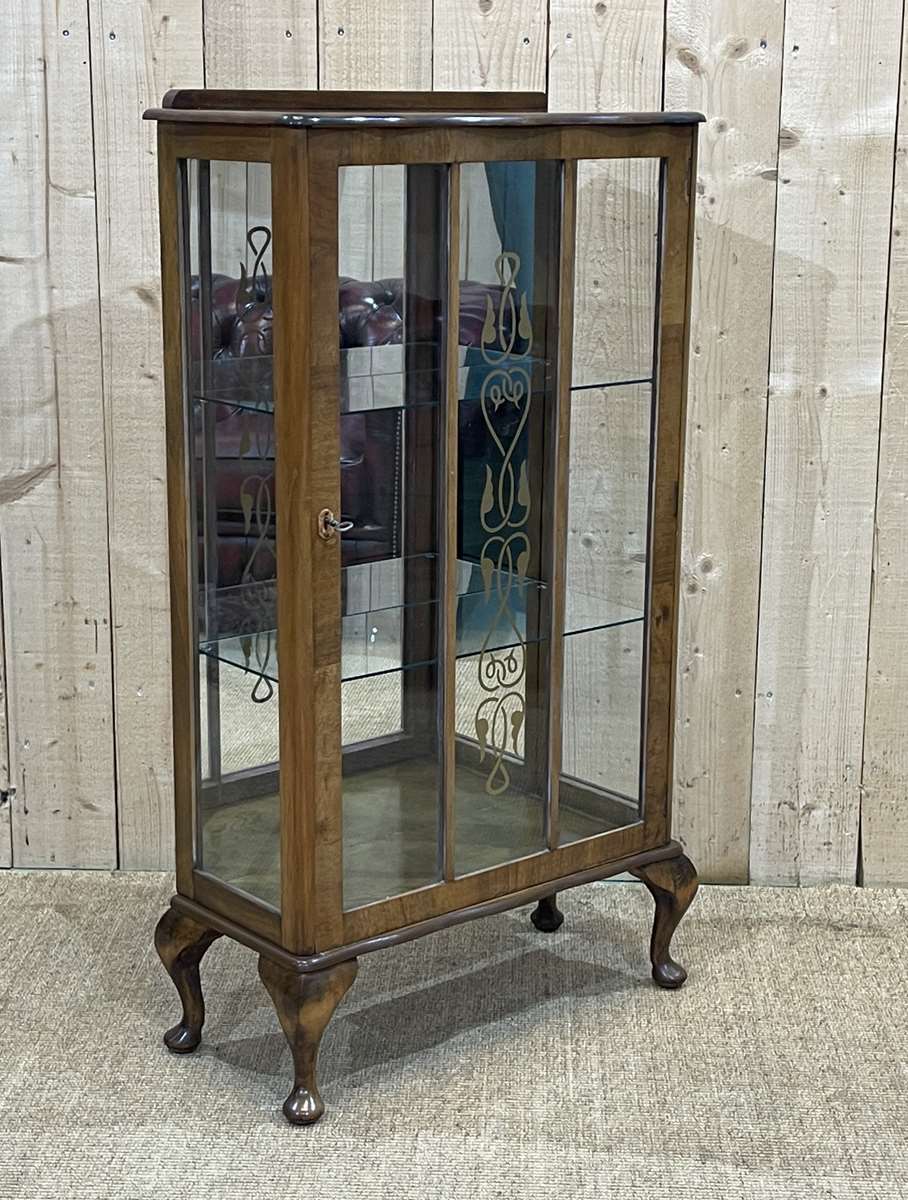 English walnut showcase from the 1950s