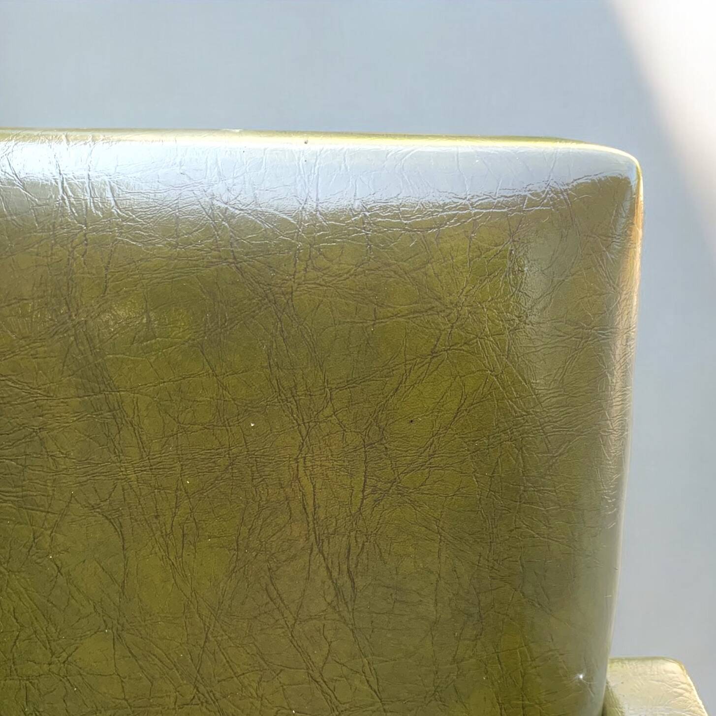 Vintage children's armchair in green skai