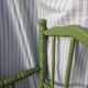 Green children's chair in turned wood