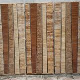 Straw and woven rope screen with metal structure