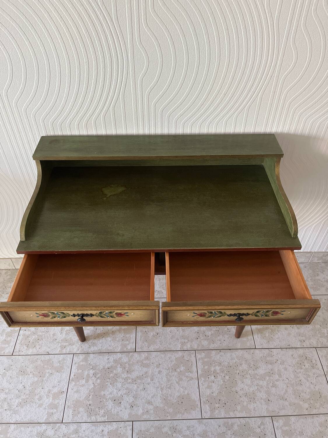 Wooden dressing table with olive green chair and floral patterns