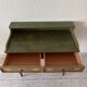 Wooden dressing table with olive green chair and floral patterns