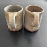 Pair of signed stoneware mugs