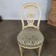 5 chaises en bois laqué blanc style Louis XVI
