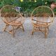 Paire de fauteuils corbeille en rotin années 60