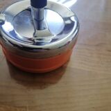 Vintage orange rotating ashtray