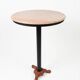 Bistro standing table with marble top and cast iron base.