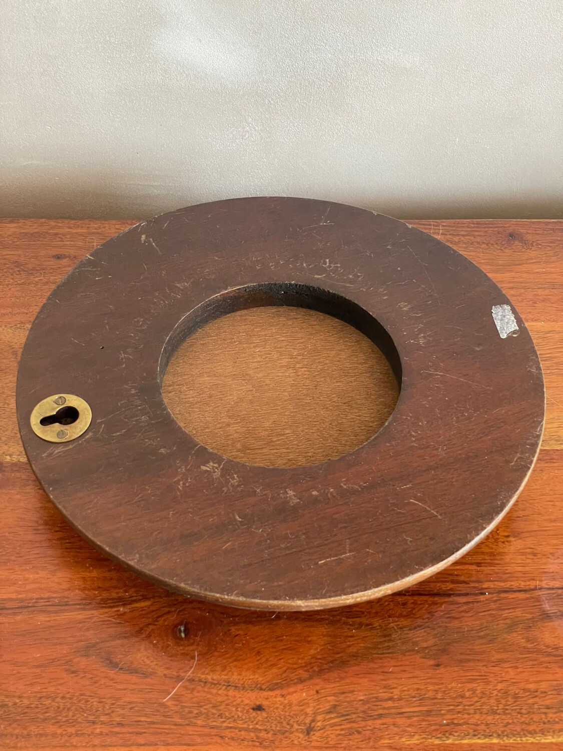 Wood and brass mirror