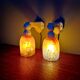 Pair of Art Deco wall sconces in multicoloured porcelain and frosted glass.