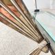 Vintage Italian coffee table in glass, chrome and brass metal, Hollywood Regency style, 1970s.