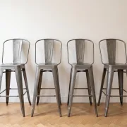4 industrial grey metal Tolix bar stools