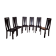 Set of 6 wooden chairs covered in leather.