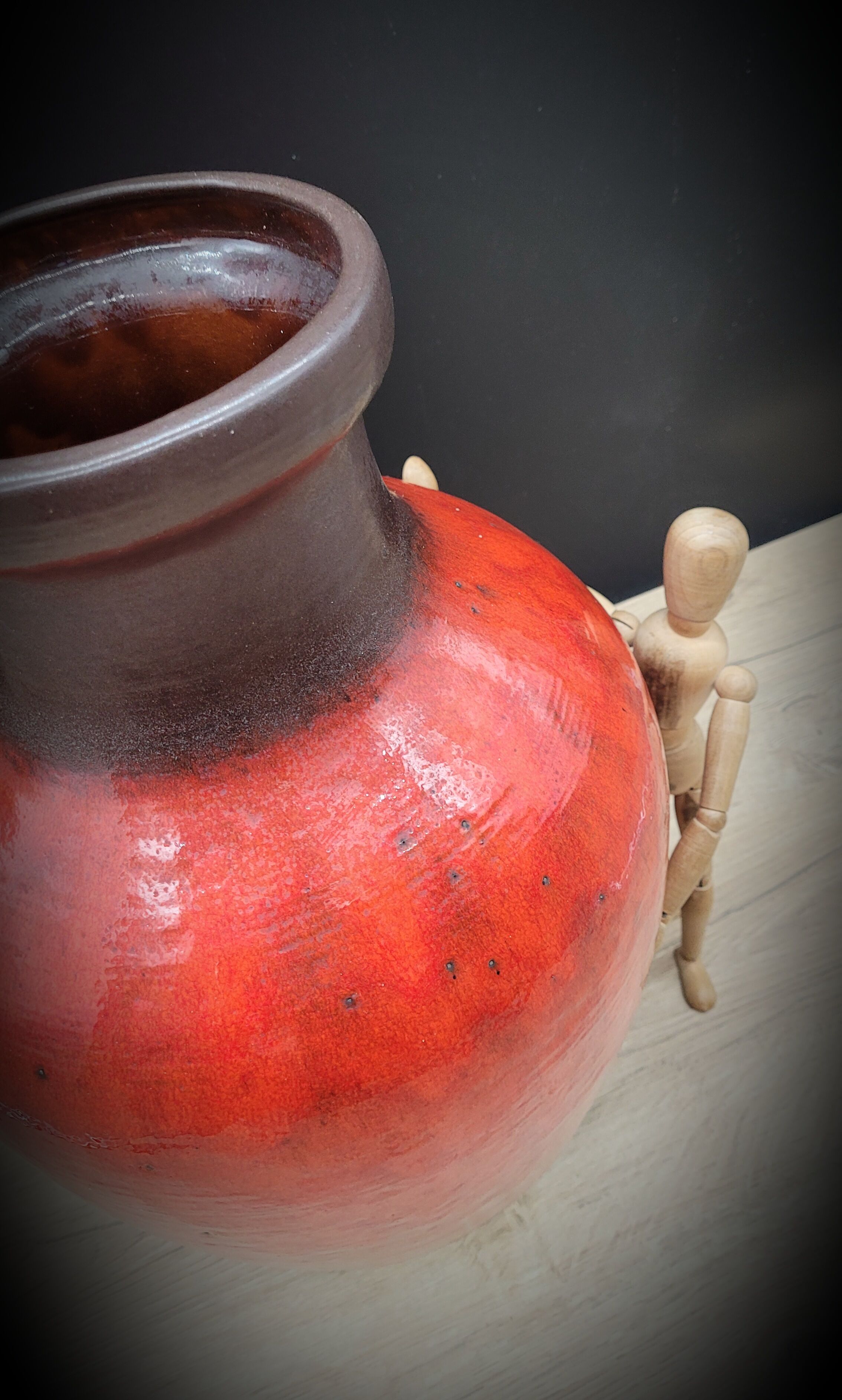Red ceramic vase