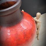 Red ceramic vase