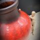 Red ceramic vase
