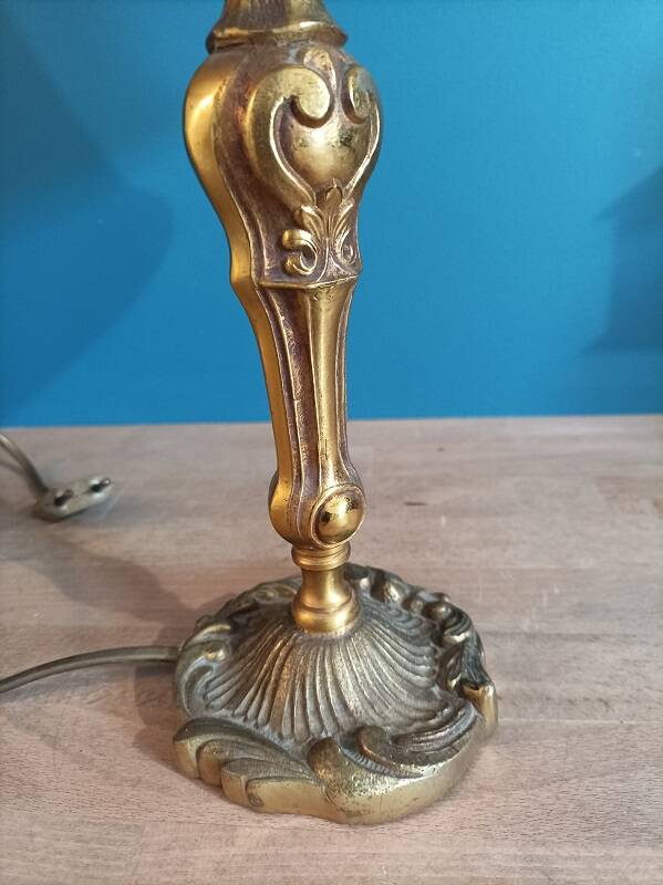 Living room lamp with golden bronze base and shade