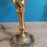 Living room lamp with golden bronze base and shade