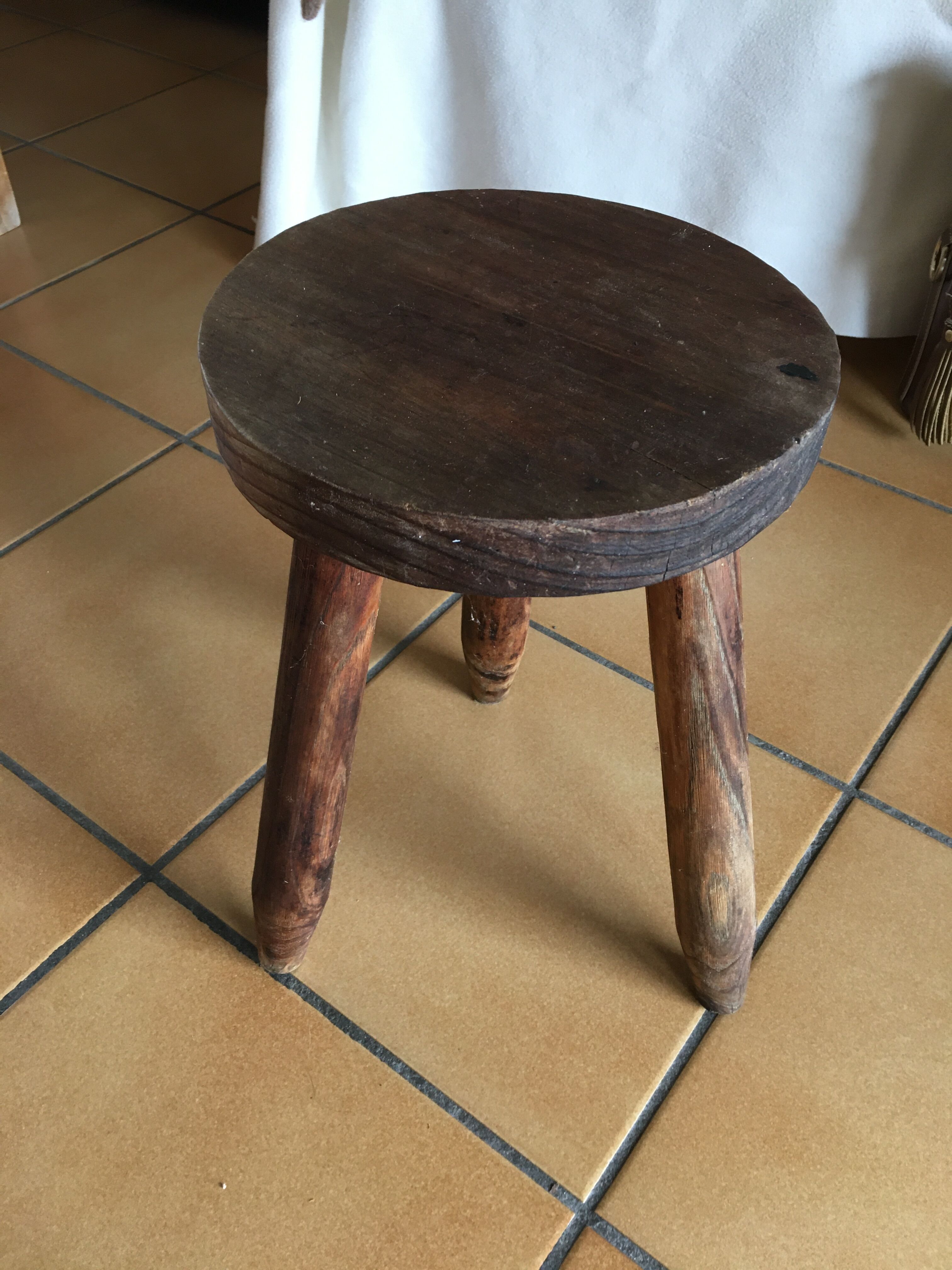 Wooden milking stool