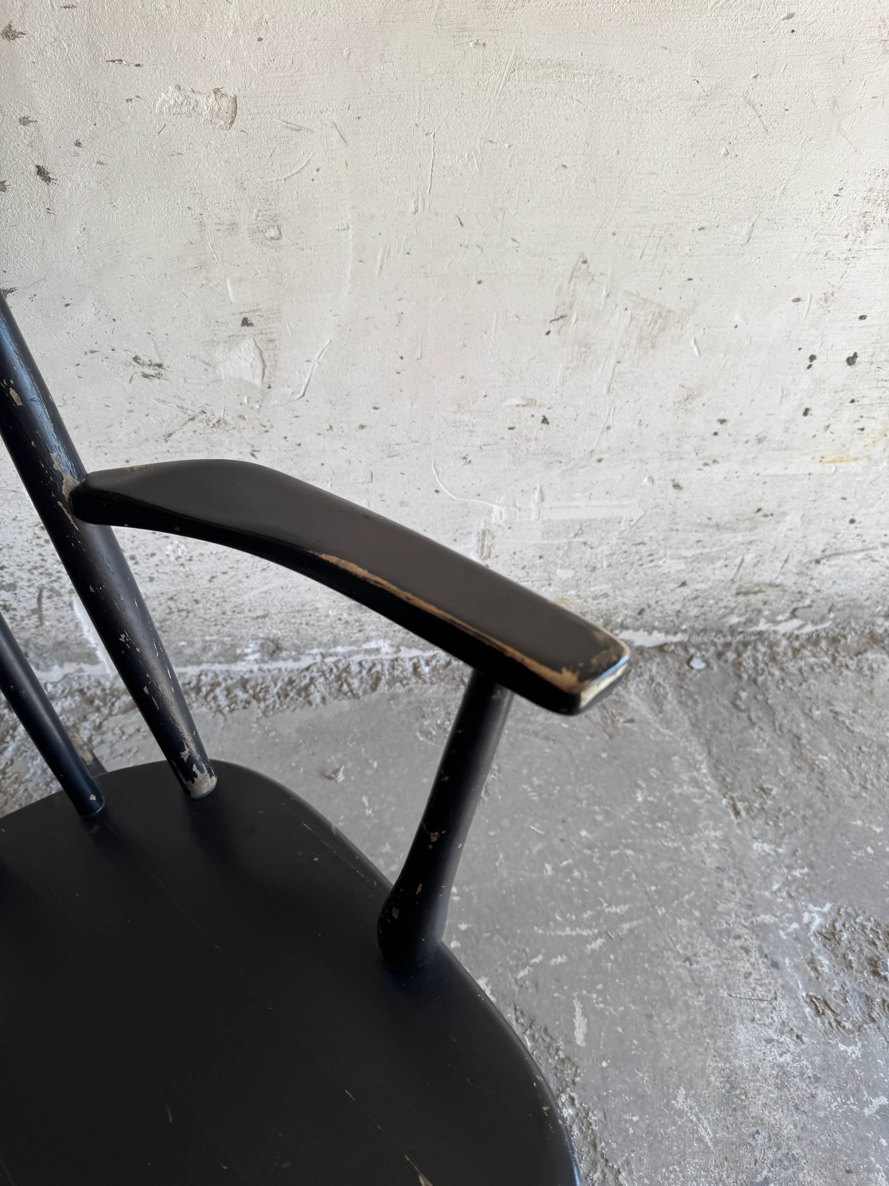 Black solid wood Scandinavian Windsor rocking chair — tall spindle back, mid-20th century