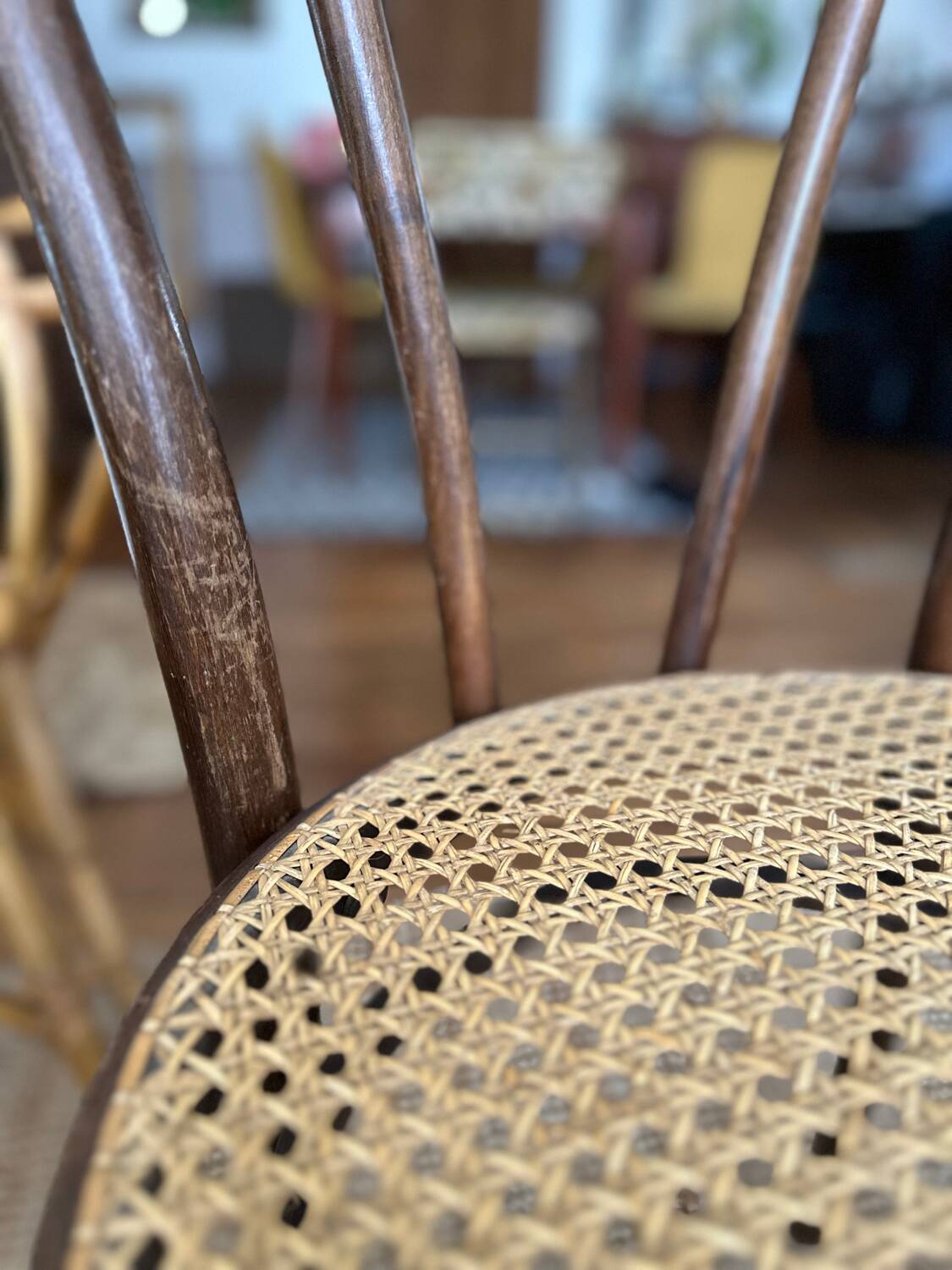 Wooden and cane bistro chairs