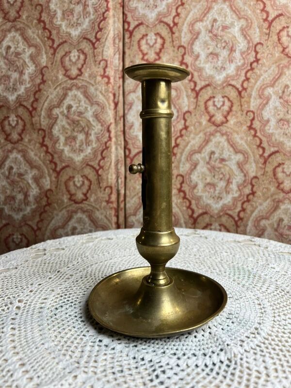 Gold-plated brass candlestick with push button