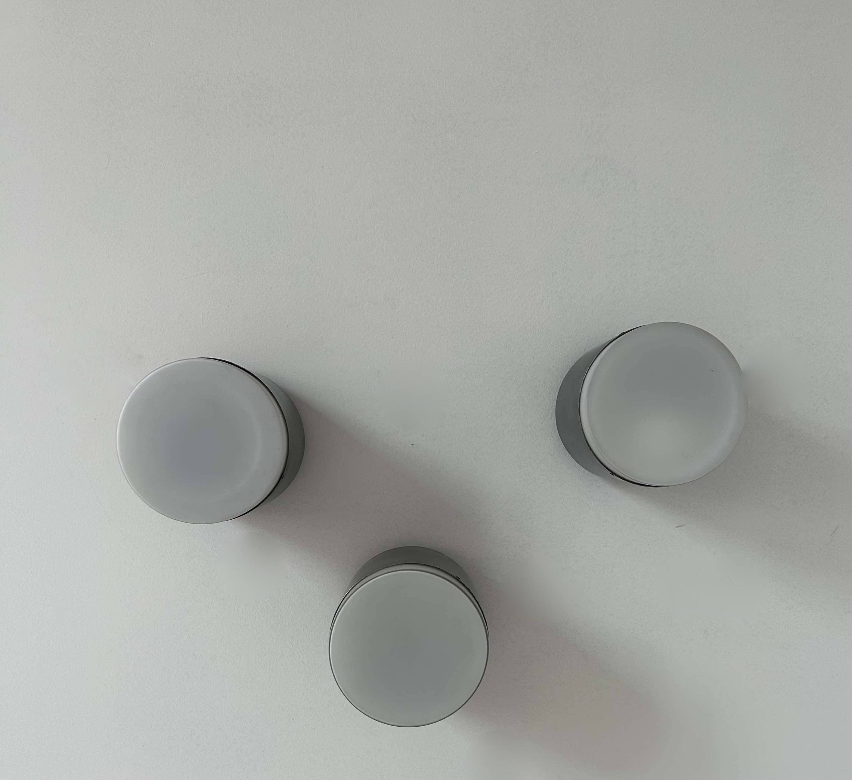 Set of 3 vintage Raak wall lights, aluminum and opaline, Holland 1960