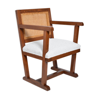 Fabric and caning armchair, 1950s.