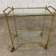 1960s serving table in glass and gilded brass