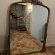 Large gilded mirror with pediment