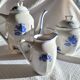 Blue and white ceramic coffee service with vintage flowers.
