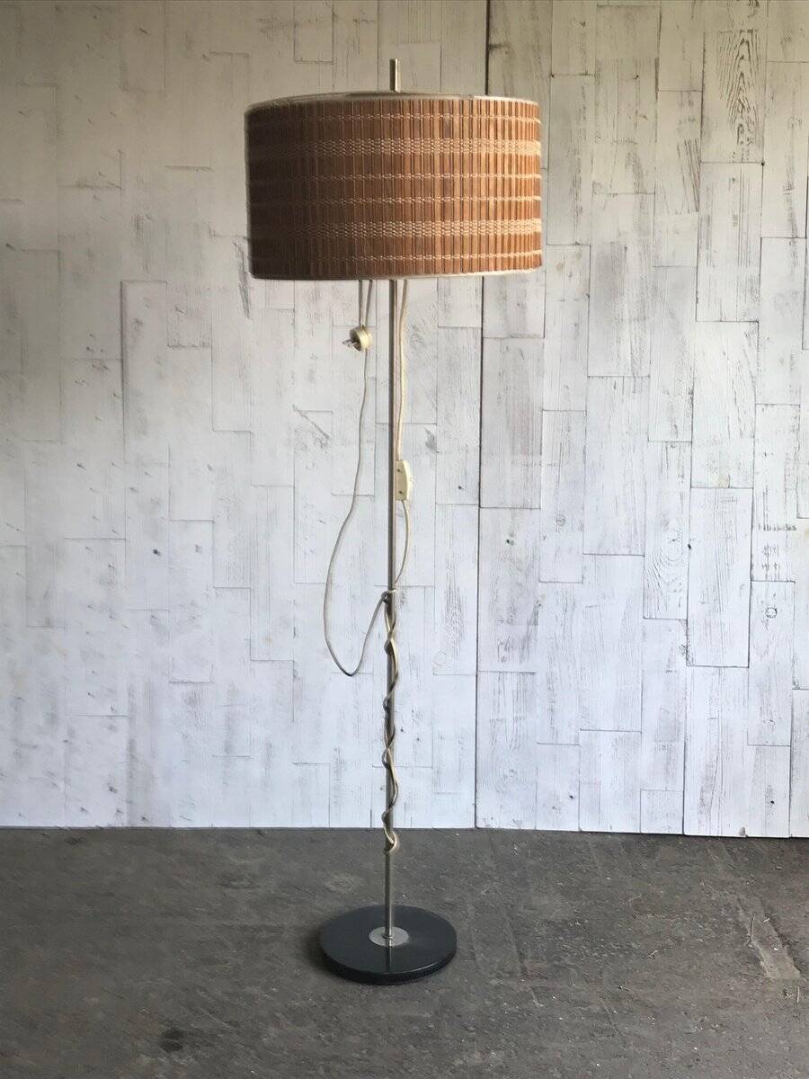 Mid-Century brown wooden and metal floor lamp, large diameter woven lampshade from the 1950s.