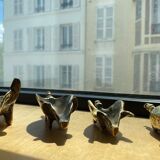 4 Pfizer bronze ashtray pigs