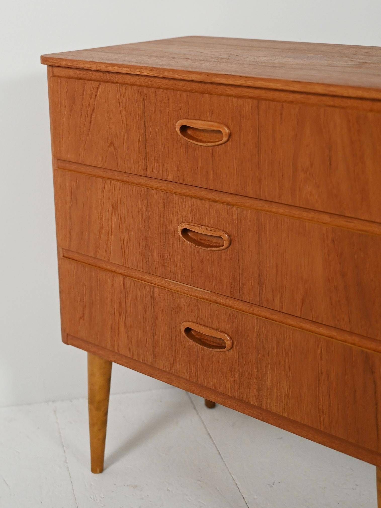 Scandinavian Chest of Drawers in teak with turned birch legs, 1950s