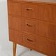 Scandinavian Chest of Drawers in teak with turned birch legs, 1950s