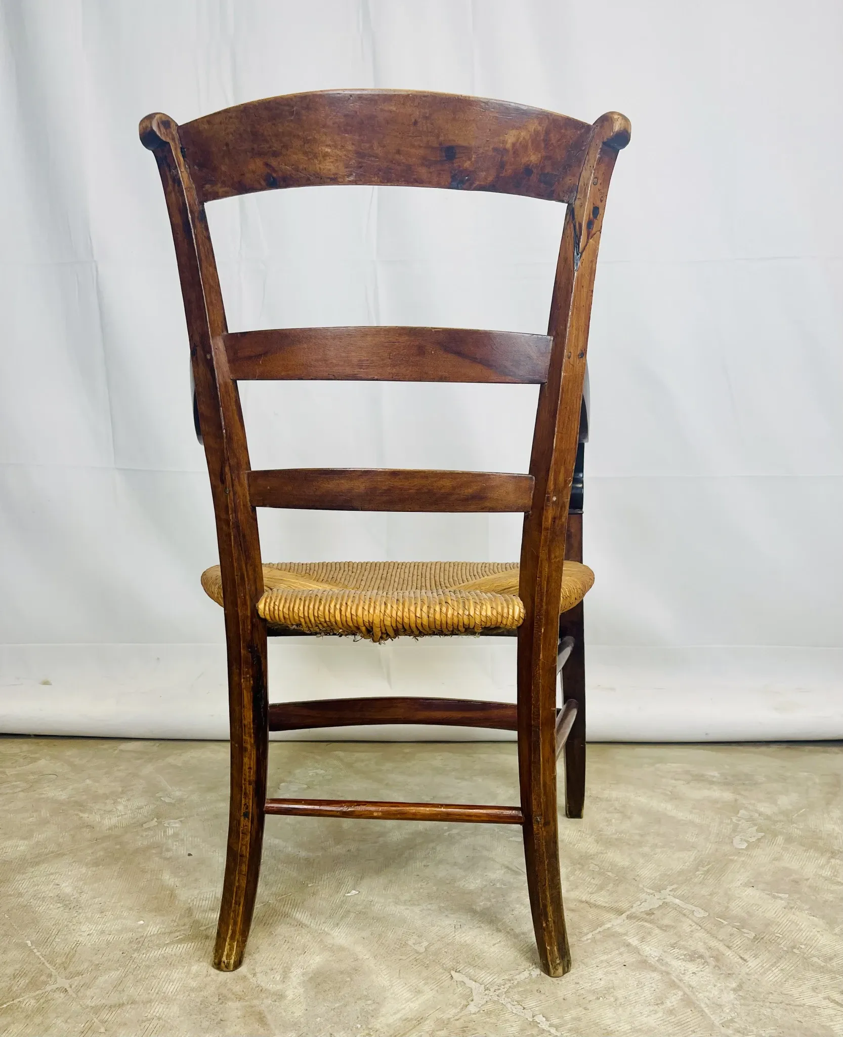 Pair of dissimilar walnut armchairs