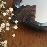 Vintage fiddle mirror to put down.