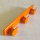 Orange wall coat rack by Syla - 1970s