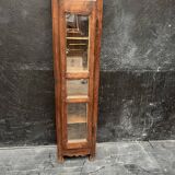 Old narrow wooden showcase.
